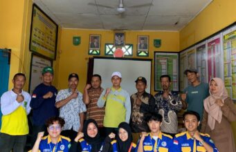 Mahasiswa KKN UNRI Sosialisasikan Mitigasi Bencana dan Pemasangan Jalur Evakuasi di Kepenghuluan Rokan Baru