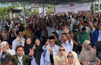 Di Tengah Derasnya Banjir, Kampanye Paslon H Bistamam-Jhony Charles di Bagan Punak Membludak